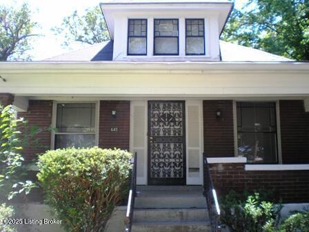 doorway to property featuring a porch