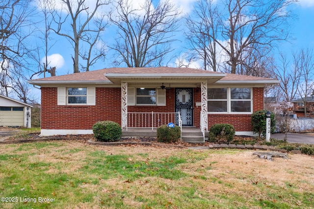 view of front of home featuring a front lawn and covered porch