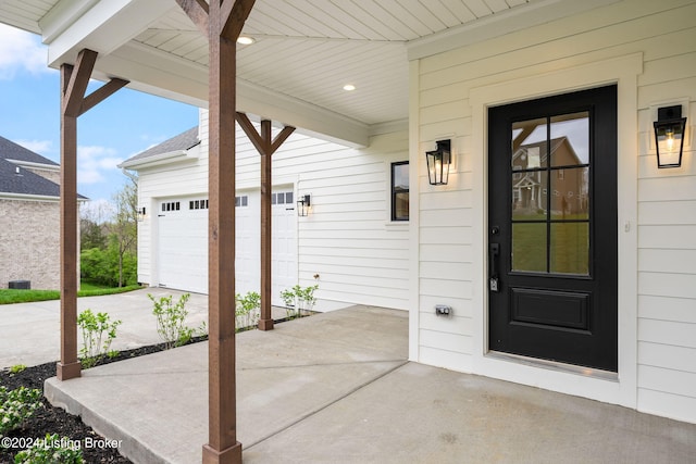 entrance to property with a garage