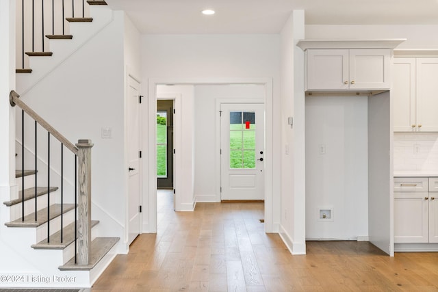 entrance foyer featuring light hardwood / wood-style floors