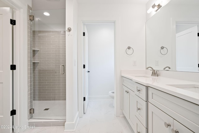 bathroom with toilet, a shower with shower door, and vanity