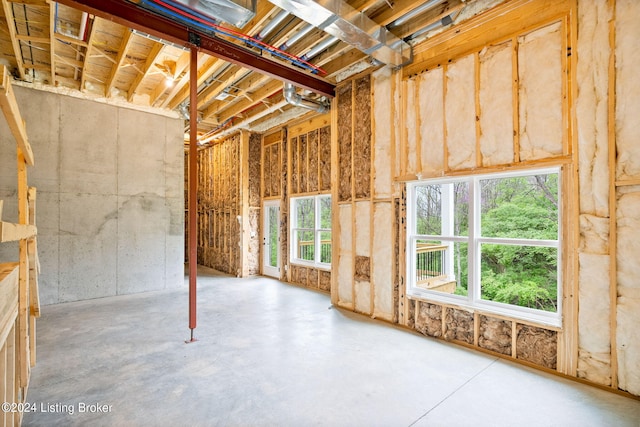 misc room featuring concrete floors and plenty of natural light