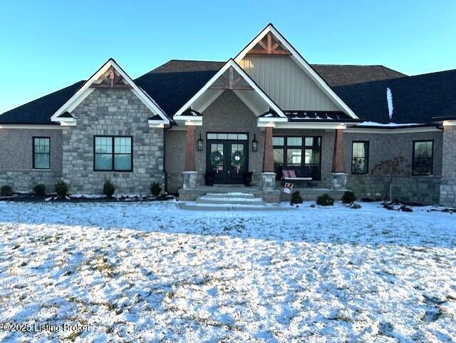 craftsman-style house featuring french doors