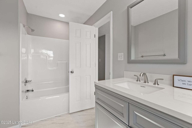 bathroom featuring vanity and shower / bathtub combination