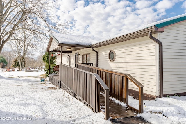 view of snow covered property