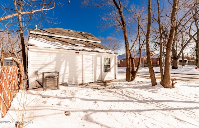 view of snow covered garage