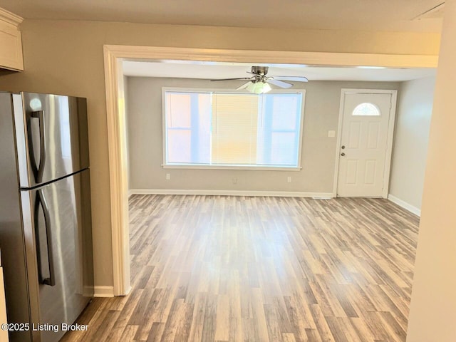 interior space featuring ceiling fan and light hardwood / wood-style floors