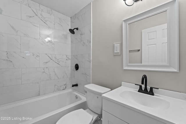 bathroom featuring toilet, vanity, and shower / bath combination