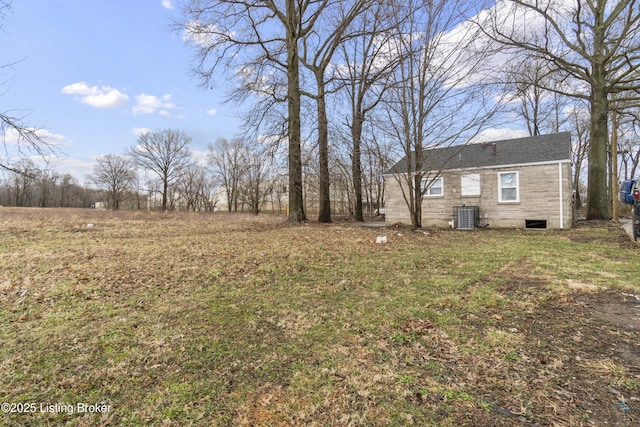 view of yard featuring central AC