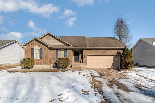 ranch-style house featuring a garage