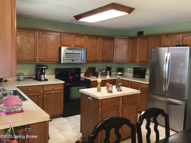 kitchen featuring sink and appliances with stainless steel finishes