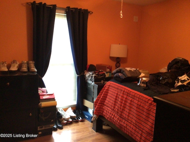 bedroom featuring hardwood / wood-style floors