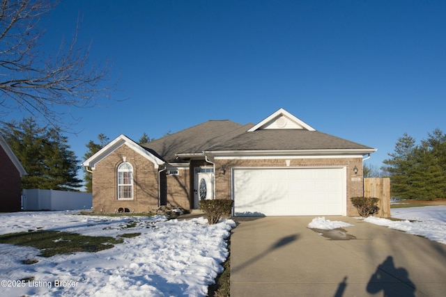 single story home with a garage