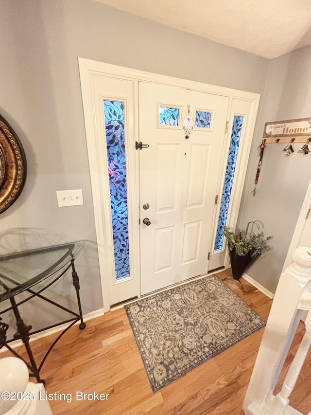 entrance foyer with light hardwood / wood-style flooring