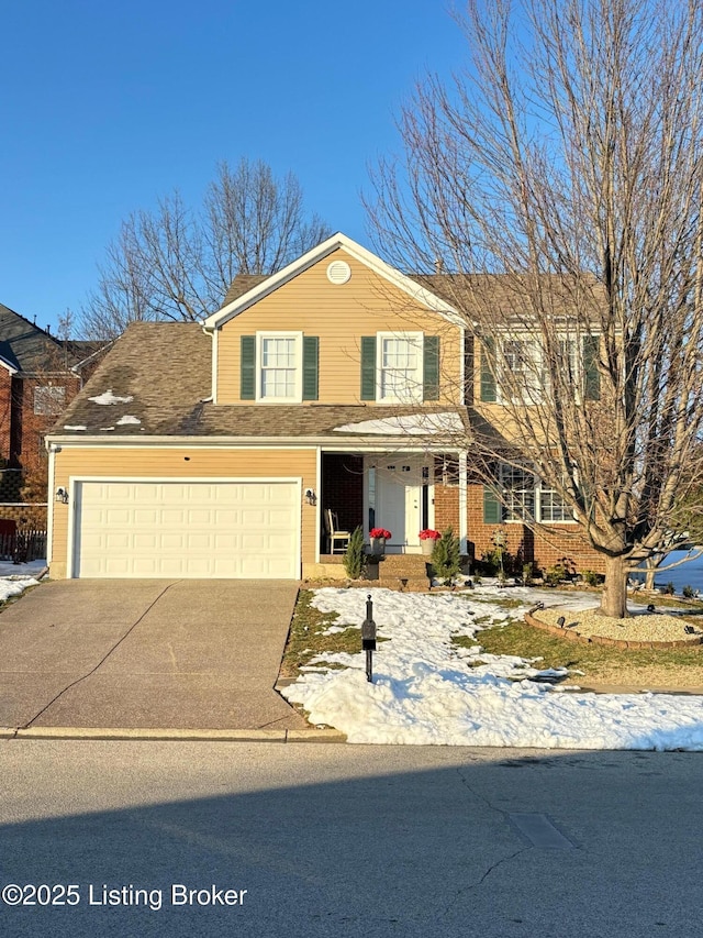 view of front of property featuring a garage