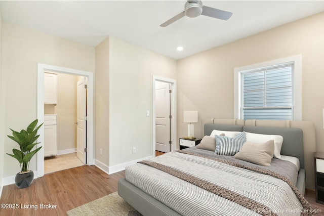 bedroom featuring recessed lighting, baseboards, light wood finished floors, and ceiling fan