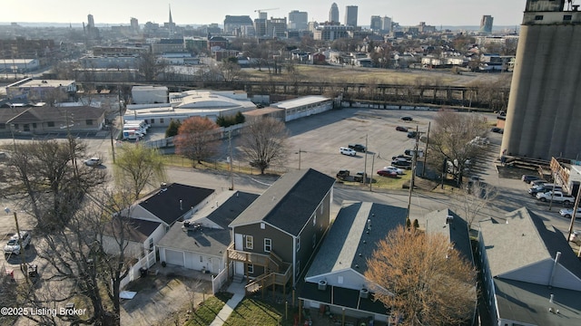 birds eye view of property with a view of city