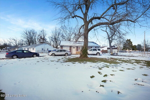 view of yard layered in snow