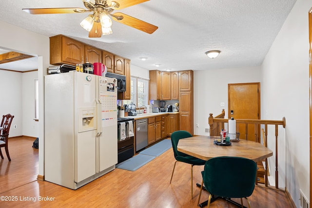 kitchen featuring ceiling fan, stainless steel dishwasher, light hardwood / wood-style flooring, a textured ceiling, and white fridge with ice dispenser