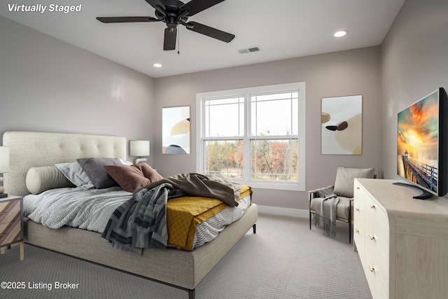 carpeted bedroom featuring ceiling fan