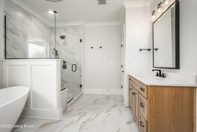 bathroom with vanity, crown molding, and independent shower and bath