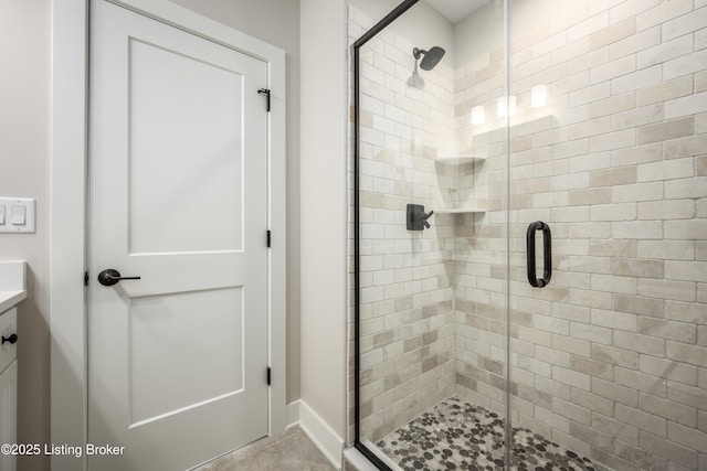 bathroom with vanity and walk in shower