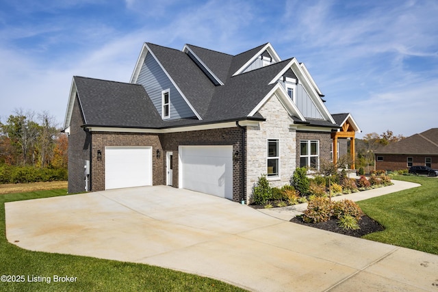 view of front of home featuring a garage and a front yard