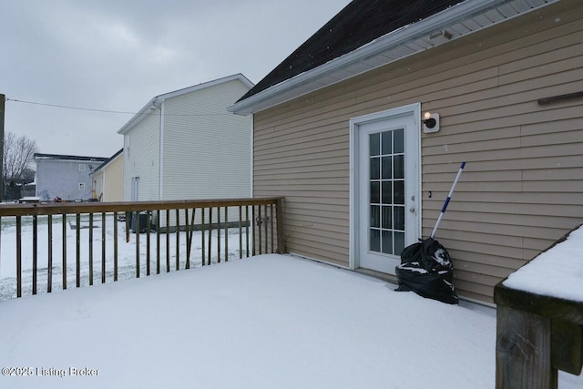 view of snow covered deck