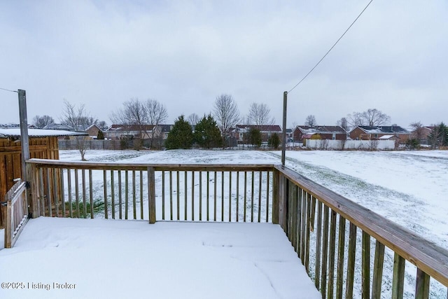 view of snow covered deck