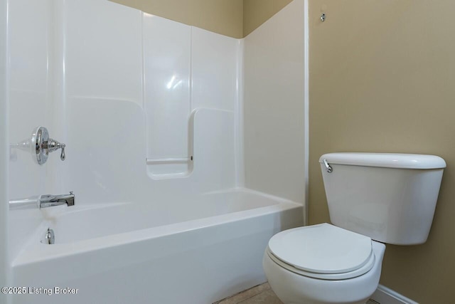 bathroom with toilet and shower / bath combination