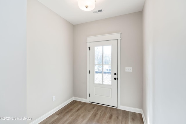 doorway to outside featuring light wood-type flooring