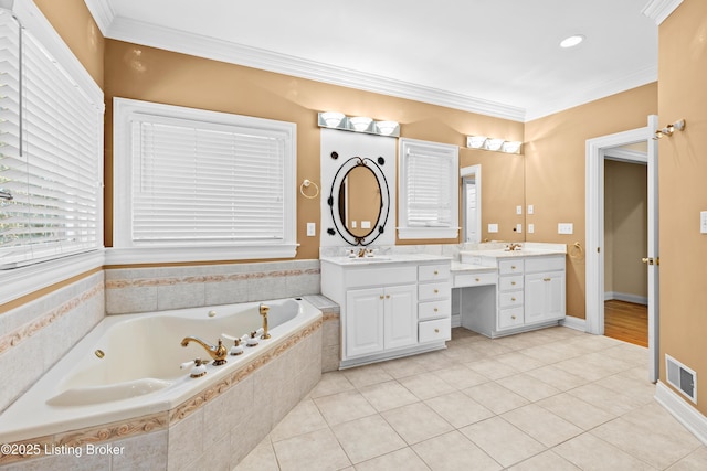 bathroom featuring vanity, tile patterned floors, crown molding, and a relaxing tiled tub