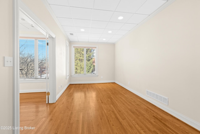 unfurnished room featuring light hardwood / wood-style floors