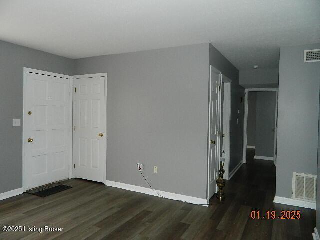 interior space featuring dark hardwood / wood-style flooring