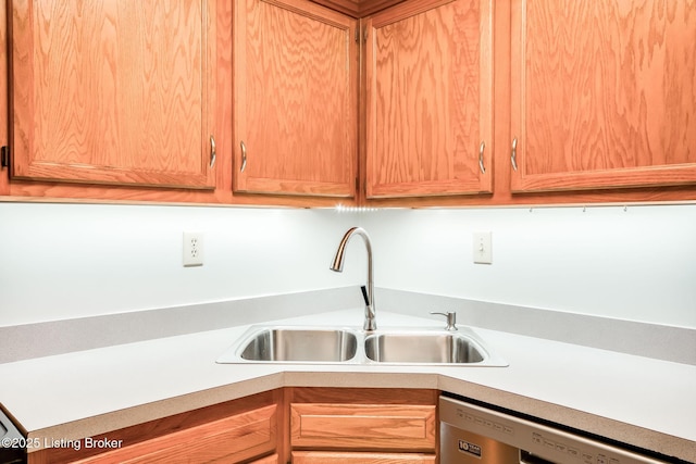 kitchen with sink and dishwashing machine