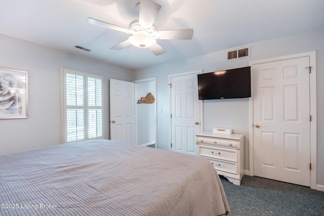 carpeted bedroom with ceiling fan