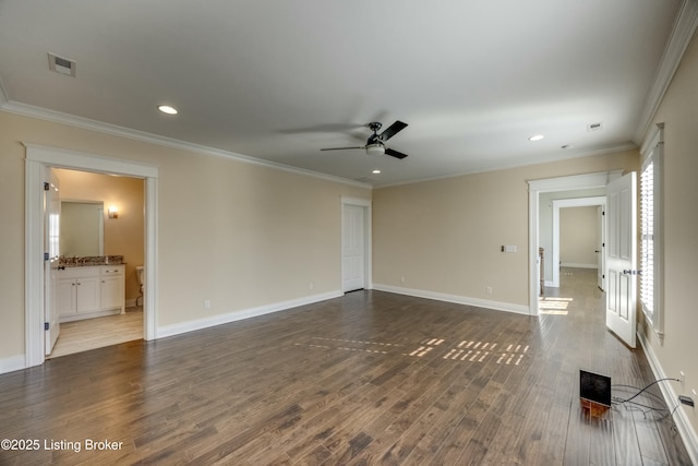 unfurnished living room with ornamental molding, dark wood-style flooring, visible vents, and a ceiling fan