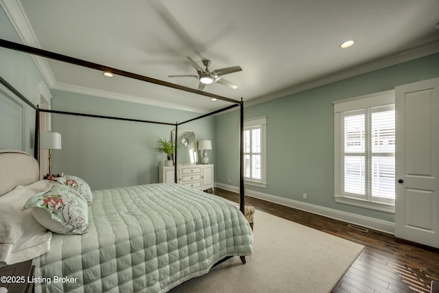 bedroom featuring recessed lighting, crown molding, baseboards, and wood finished floors