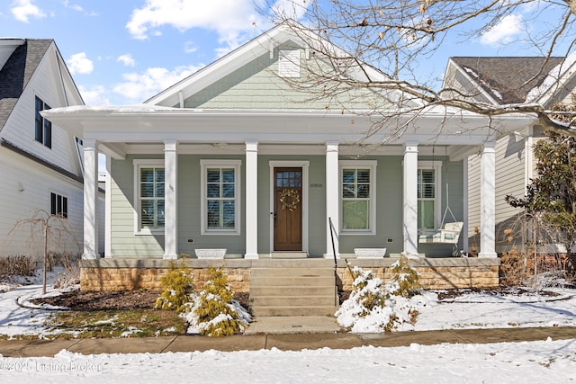 view of front of property featuring covered porch