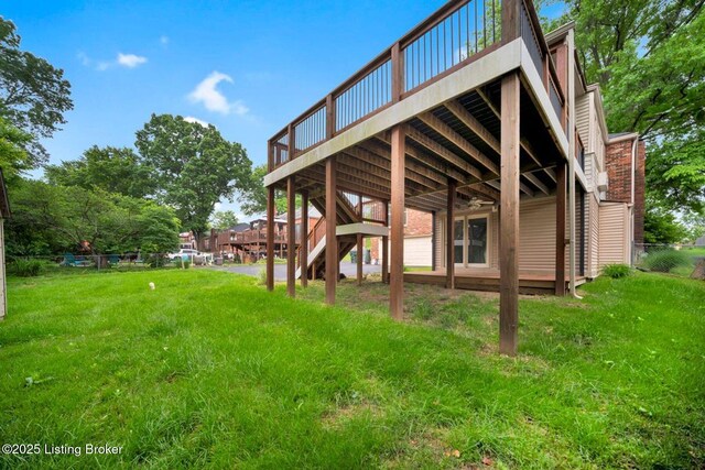 8923 La Costa Rd, Jeffersontown, KY 40299 - back of property with a wooden deck and stairway