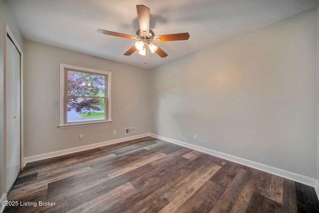 8923 La Costa Rd, Jeffersontown, KY 40299 - unfurnished bedroom featuring wood finished floors, baseboards, and a closet