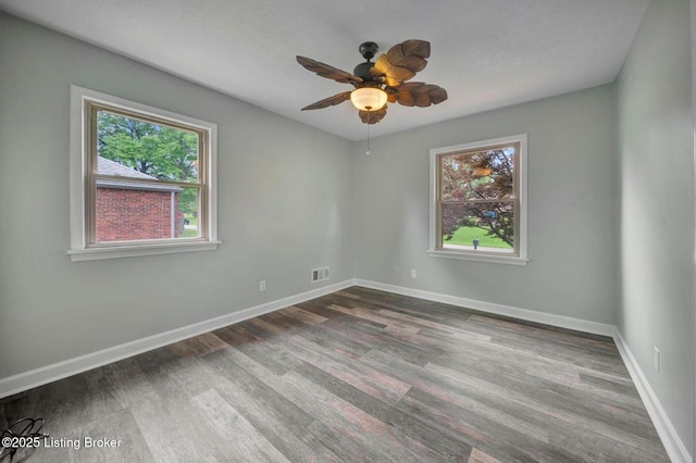 8923 La Costa Rd, Jeffersontown, KY 40299 - spare room with a ceiling fan, dark wood-type flooring, and baseboards