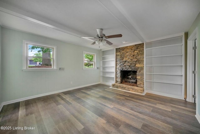 8923 La Costa Rd, Jeffersontown, KY 40299 - unfurnished living room featuring wood finished floors, a ceiling fan, baseboards, built in shelves, and a fireplace