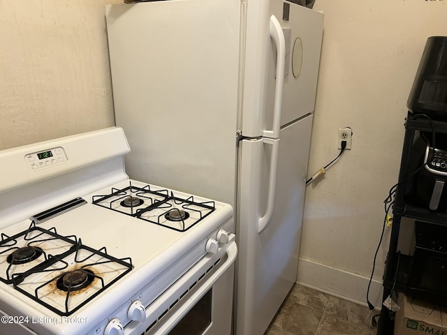 kitchen with white gas stove