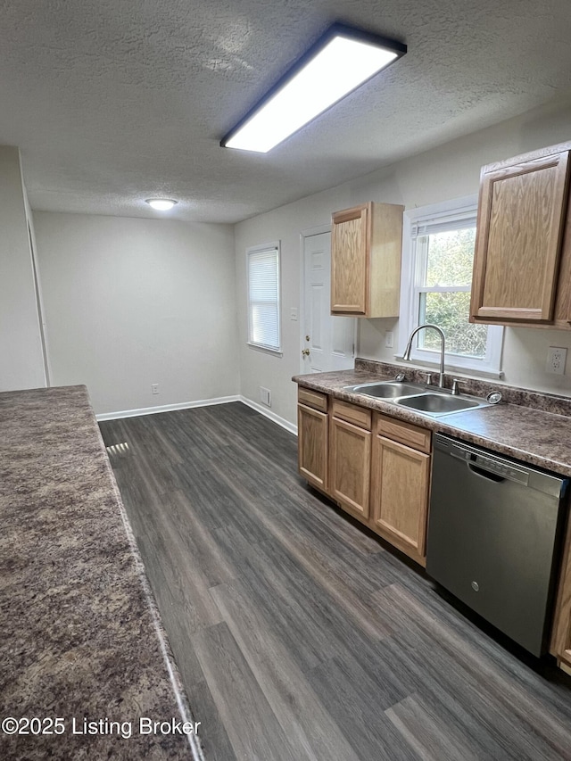 kitchen featuring dark hardwood / wood-style floors, light brown cabinetry, dishwasher, a textured ceiling, and sink