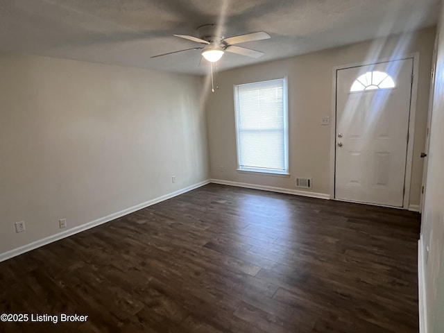 entryway featuring ceiling fan and dark hardwood / wood-style floors