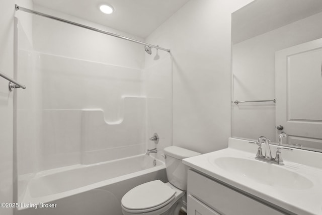 full bath featuring toilet, washtub / shower combination, and vanity