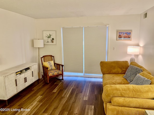 living room with dark hardwood / wood-style floors