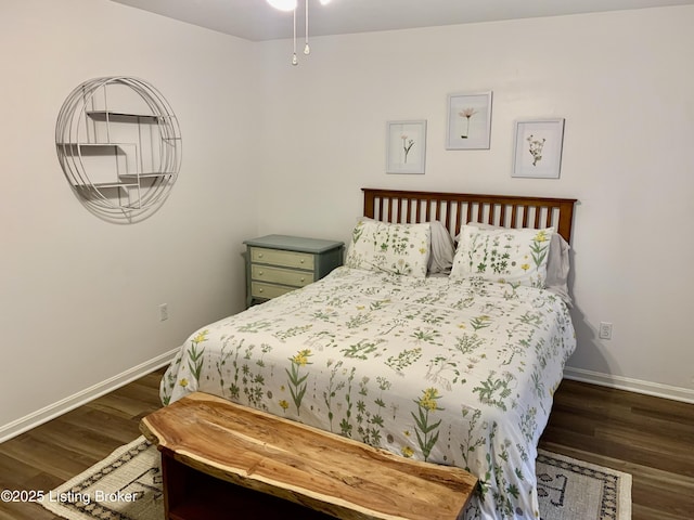 bedroom featuring dark hardwood / wood-style flooring