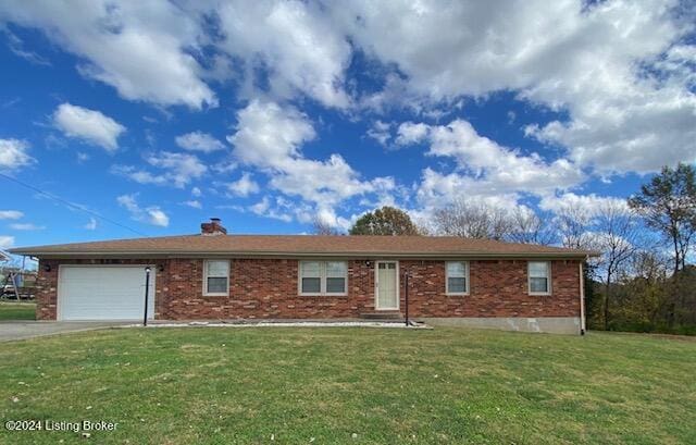 ranch-style home with a garage and a front yard